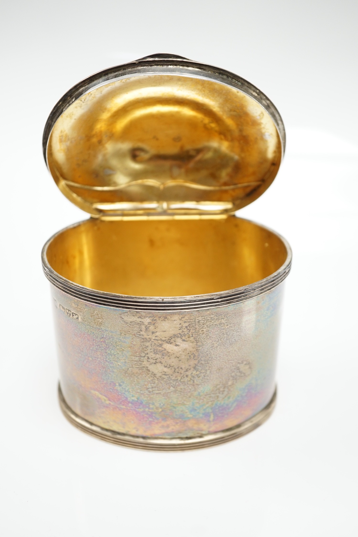 An Edwardian silver oval tea caddy, S. Blanckensee & Sons Ltd, Chester, 1908, height 83mm, 6.8oz.